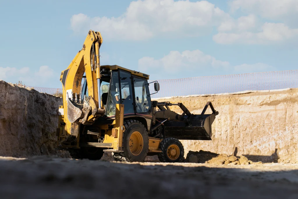 excavator-digging-ground-day-light